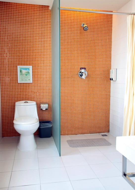 Qingdao Renjia Bussiness Hotel Bagian luar foto