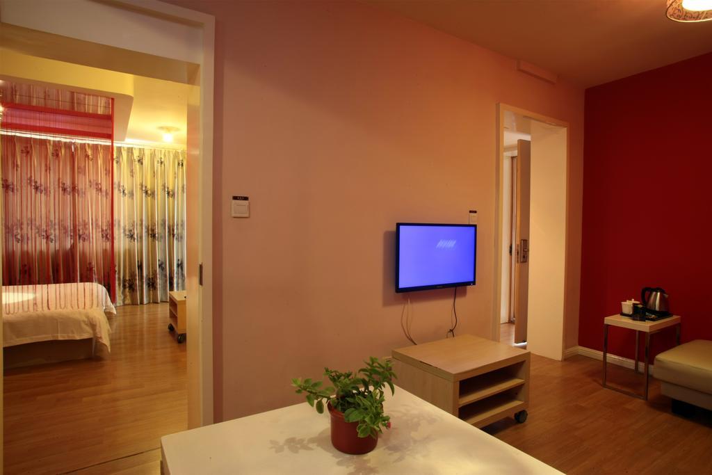 Qingdao Renjia Bussiness Hotel Bagian luar foto